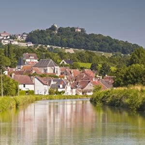 The canal Lateral a La Loire (Loire Lateral Canal) and the village of Menetreol sous Sancerre, with the village of Sancerre on the hill behind, Cher, Centre, France, Europe