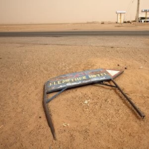 A fallen signposts in the desert