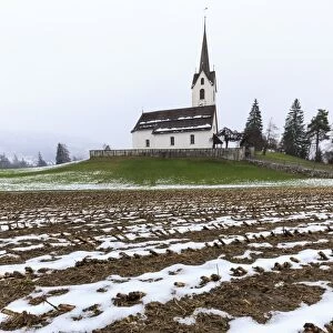 Fields ploughed in front of the church, Versam, Safiental, Surselva, Graubunden, Switzerland