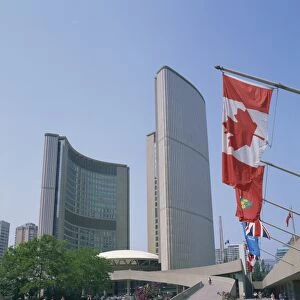 Flags outside the modern buildings of City Hall in Toronto, Ontario, Canada