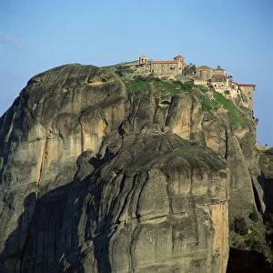 Hill of bare rock on top of which is the Holy Monastery