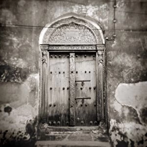 Image taken with a Holga medium format 120 film toy camera of old Omani studded timber door
