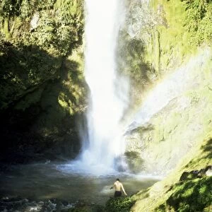 Man takes a bath in waterfall, Los Chorros Falls, Poas Valley, Costa Rica