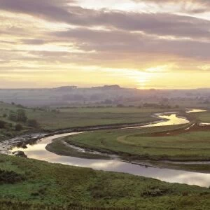 Meandering River Aln at sunset, Foxton, near Alnmouth, Northumberland, England, UK