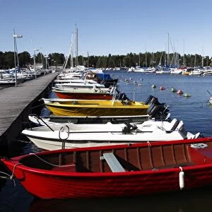 Motor boats moored at jetty in the marina, Syaraumanlahti Bay, Gulf of Bothnia