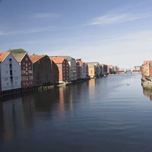 The Nidelva with merchants warehouses each side leading to the old dock area