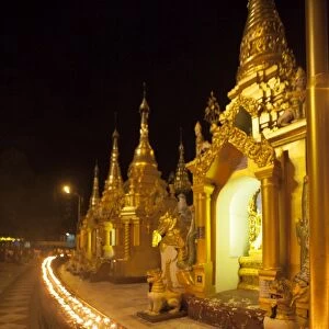 Oil lamps, Shwedagon Pagoda, Yangon (Rangoon), Myanmar (Burma), Asia