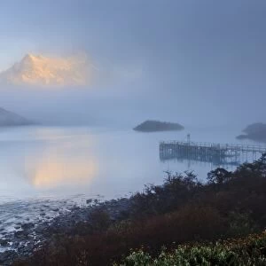 Reflection in the clearing fog, Lago Pehoe, Torres del Paine National Park, Patagonia, Chile, South America