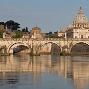 The River Tiber with Ponte Sant Angelo bridge and St. Peters Basilica, Rome, Lazio, Italy, Europe