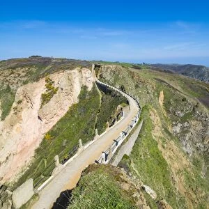 Road connecting the narrow isthmus of Greater and Little Sark, Channel Islands, United Kingdom
