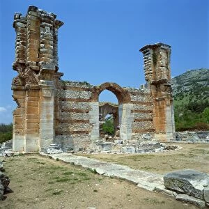 Ruins of gateway and wall in the town built for Octavia