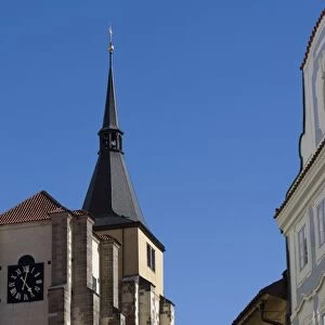 Street with church spire, Old Town, Prague, Czech Republic, Europe