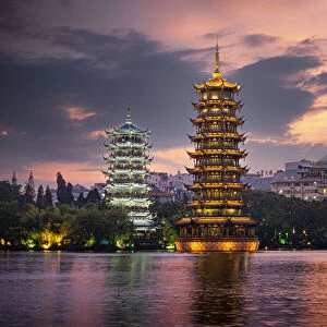 Sun and Moon pagodas at sunset in Guilin, Guilin, Guangxi, China, Asia