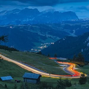 Traffic trail lights on Sella Pass, Province of Bolzano, South Tyrol, Italian Dolomites