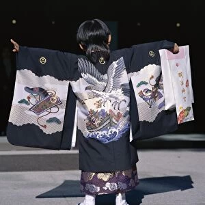 Back view of a small boyin traditional clothing at the Shichi-go-san