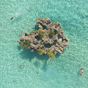 a drone shot to capture some people snorkeling around Crystal Rock, Le Morne Brabant