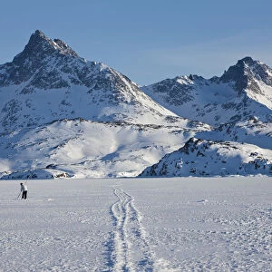 Ice fishing, King Oscar Fijord, Tasiilaq, Greenland, winter
