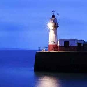 The Lighthouse at the end of the Newlyn Pier at dawn, long exposure, Newlyn, Cornwall, UK