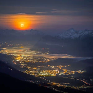 The moon setting down over the Stubai Alps, Kuhmesser mountain, Schwaz province, Innsbruck Land, Tyrol, Austria