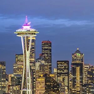 Night view over downtown skyline with the iconic Space Needle in the foreground, Seattle, Washington, USA