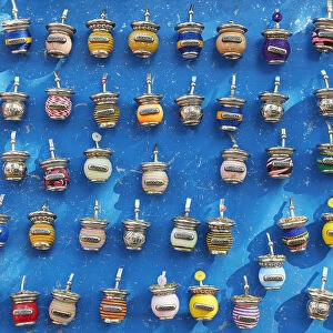 Small colorful magnets with the shape of a "Mate" on sale in a street stand of La Boca, Buenos Aires, Argentina. The "Mate" is a traditional South American caffeine-rich infused drink