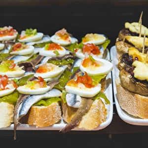 Spain, Basque Country, San Sebastian (Donostia). Traditional Pinchos (Pintxos) snacks
