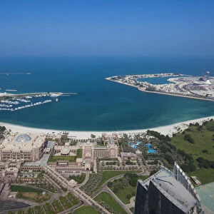 UAE, Abu Dhabi, Emirates Palace Hotel and Arabian Gulf, aerial view