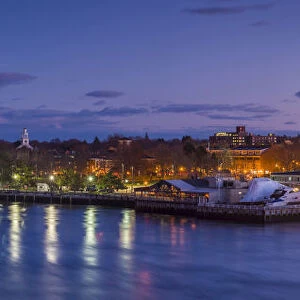 USA, Massachusetts, Newburyport, skyline from the Merrimack River, dusk