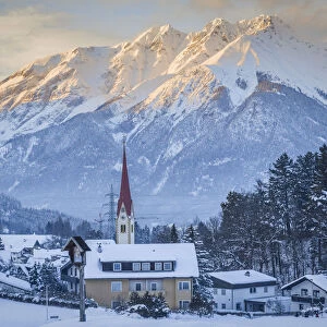 The village of Vill in winter with the Nordkette in the background, Innsbruck, Tyrol