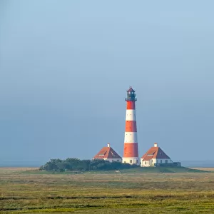 Westerhever Lighthouse at sunrise, built in 1906, Westerhever, Nordfriesland