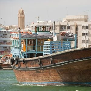 Dhows and water taxis on the Dubai Creek in Dubai