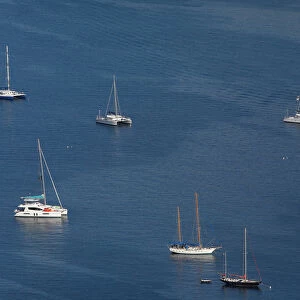 Sailboats and small ships are seen in the bay in front of Charlotte Amalie