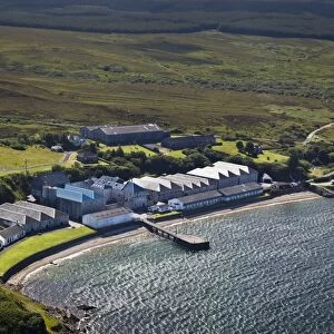 Aerial view of coastline and whisky distillery, Bunnahabhain Distillery, Isle of Islay, Inner Hebrides, Scotland