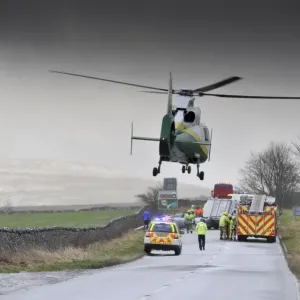 Air Ambulance attending road traffic accident in icy weather, Kirkby Stephen, Cumbria, England, December Air Ambulance attending road traffic accident in icy weather, Kirkby Stephen, Cumbria, England, December