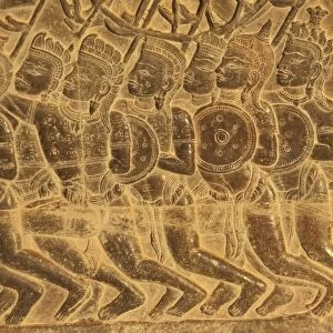 Bas-relief of soldiers at war, in Khmer temple, Angkor Wat, Siem Riep, Cambodia