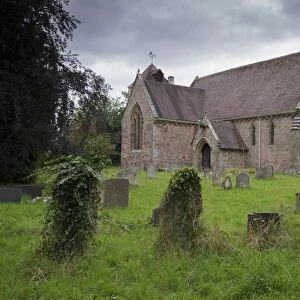Churchyard and 13th century Anglican parish church, St. Marys Church, Acton Burnell, Shropshire, England, August