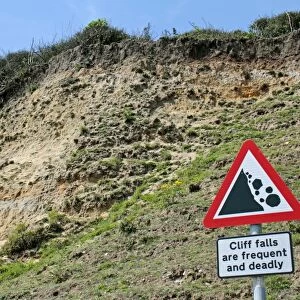 Cliff falls are frequent and deadly sign beside coastal cliff erosion, Dunwich, Suffolk, England, july