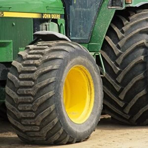 Farm machinery, big wheels on John Deere tractor, Sweden