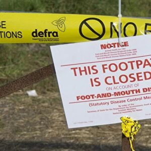 This Footpath is Closed on Account of Foot and Mouth Disease sign on gate in farmland, Surrey, England, September 2007