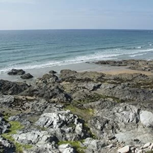 Greenstone igneous rocks on beach, Fistral Bay, Newquay, Cornwall, England, July