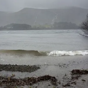 Heavy rain and stormy conditions on reservoir, with swollen streams running down side of Helvelyn, Thirlmere Heavy rain and stormy conditions on reservoir, with swollen streams running down side of Helvelyn, Thirlmere