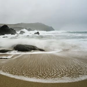 Incoming tide on beach, Clogher Bay, Clogher, Dingle Peninsula, County Kerry, Munster, Ireland, November