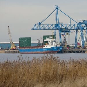 Isartal cargo ship unloading at docks, River Trent, Flixborough, Scunthorpe, North Lincolnshire, England, january