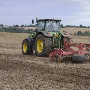 John Deere 7930 tractor with Vaderstad disc cultivator, cultivating arable field, Bridgnorth, Shropshire, England