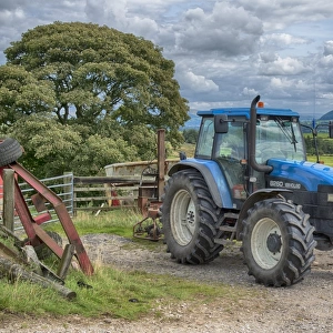 New Holland 8260 tractor in farmyard, Lancashire, England, August