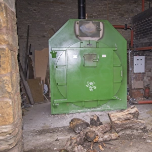 Pig farming, biomass boiler providing heat for pig unit, Yorkshire, England, October