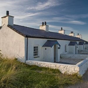 Pilot cottages used to service pilot boats and lifeboats on tidal island, Llanddwyn Island