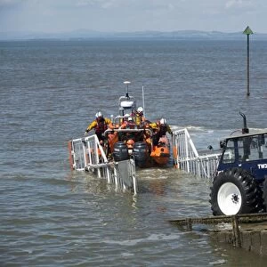 RNLI B-class Atlantic 85 rigid inflatable lifeboat, returning into launch ramp after training exercise, Silloth