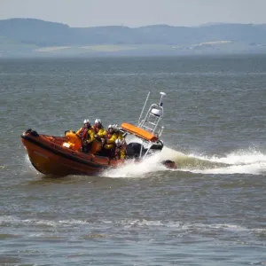 RNLI B-class Atlantic 85 rigid inflatable lifeboat, on training manoeuvres at sea, Silloth, Solway Bay, Cumbria RNLI B-class Atlantic 85 rigid inflatable lifeboat, on training manoeuvres at sea, Silloth, Solway Bay, Cumbria