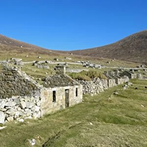 Ruins of houses in abandoned village, Village Bay, St. Kilda, Outer Hebrides, Scotland, march